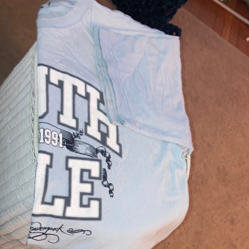 Xl light blue South Pole shirt. Small holes in armpits